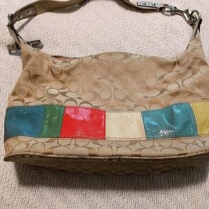 Coach tan purse with color stripe